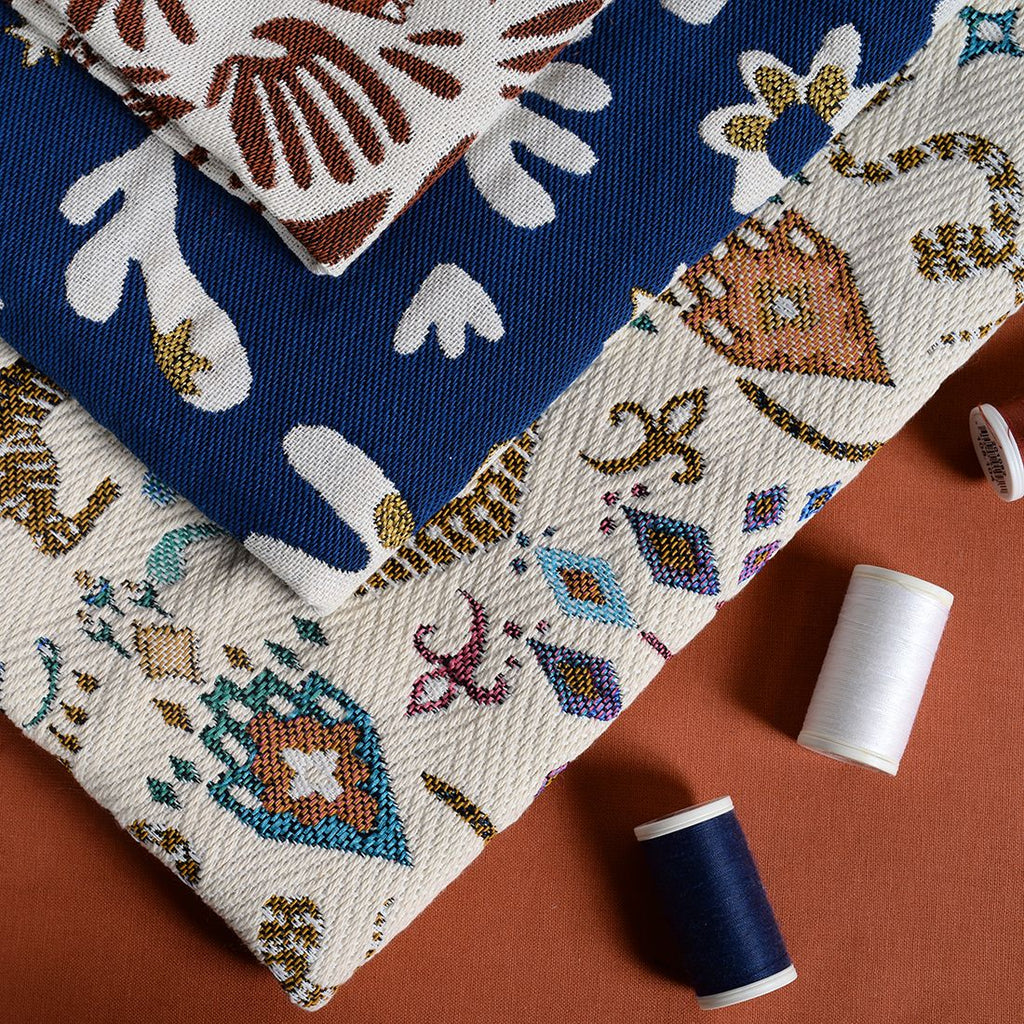 Tissu Jacquard Tibétain – Écru & Multicolore - création textile durable - Mycobloom